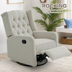 a white recliner chair sitting on top of a rug