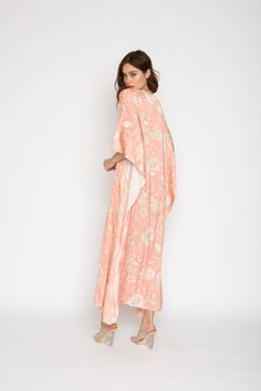 Printed Long Caftan Can be worn loose or cinched at the waist Comes with a matching belt as an option for styling Lusciously soft poly-silk blend for ease of care Machine wash cool Tumble-dry low Spring Beachwear Kaftan With Tie Waist, Rayon Kimono For Loungewear, Tie Waist Kimono For Loungewear, Spring Loungewear Wrap Kaftan, Flowy Tunic Kimono For Loungewear, Spring Maxi Kimono With Tie Waist, Maxi Length Spring Kimono With Tie Waist, Spring Maxi Dress For Lounging, Floral Print Kaftan For Spring Loungewear