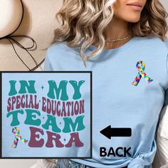 a woman wearing a light blue shirt with the words in my special education team era on it