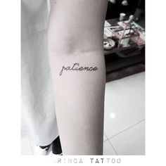 a woman's arm with the word patience tattooed on her left forearm and an inscription below it