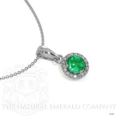 A vibrant Round Emerald measuring 5.00 x 5.00 x 3.20mm with minor clarity enhancement. It is encircled with VS2 White Diamonds that have no enhancement in an 18k White Gold setting. Luxury Emerald Necklace With Brilliant Cut, Luxury Round Brilliant Cut Emerald Necklace, Green Emerald Necklace With Brilliant Cut For Formal Occasions, Fine Jewelry Emerald Necklace With Brilliant Cut, Fine Jewelry Green Emerald Necklace With Brilliant Cut, Classic Emerald Necklace With Brilliant Cut Cubic Zirconia, Exquisite Green Emerald Necklace With Brilliant Cut, Formal Round Emerald Necklace Fine Jewelry, Formal Round Emerald Necklace