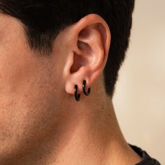 Edgy yet minimalist, our sleek Black Hoops will elevate any outfit. Whether dressed up for a special occasion or sporting a casual everyday look, these versatile earrings are a must-have in his collection. Grab all three sizes to create a set and you have the perfect gift for him! SKU: RR-ER422, RR-ER423, RR-ER424; BB-EB040 Product Details Material: Stainless Steel ∙ Hypoallergenic ∙ Waterproof ∙ Tarnish Free Finish: Black IP Featured Styles Featured Styles & Dimensions (All Sold as Pairs): Styl Small Black Hoop Earrings For Everyday, Everyday Small Black Hoop Earrings, Black Minimalist Small Hoop Earrings, Minimalist Black Hypoallergenic Piercings, Black Hypoallergenic Minimalist Piercings, Everyday Black Hypoallergenic Jewelry, Everyday Hypoallergenic Black Jewelry, Black Minimalist Cartilage Earrings For Everyday, Modern Black Piercings For Gift