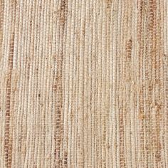 a close up view of an old woven cloth textured with brown and white stripes