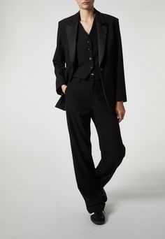 Your most comfortable mid-rise straight leg trouser pants in a clean statement look. Black charmeuse stripe detail down the leg for a classic detail. Saint Art signature wide belt loops, internal closure, and small back welt pockets. Menswear inspired suiting in feminine silhouettes and breathable, wearable fabric. The fabric is our signature tuxedo fabric - brushed poly-blend, incredibly soft and not itchy. Wear them with the matching waistcoat and tuxedo jacket for a cohesive three-piece set. Pockets Menswear, Saint Art, Art Signature, Black Waistcoat, Classic Tuxedo, Tuxedo Pants, Tuxedo Blazer, Tuxedo Style, Black Tuxedo