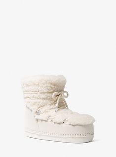 Zelda Nylon Snow Boot | Michael Kors Chunky Winter Boots, Winter Coat Style, Cute Winter Boots, Ski Trip Outfit, Luxury Boots, Warm Winter Boots, Womens Designer Boots, Warm Snow Boots, Fashionable Snow Boots