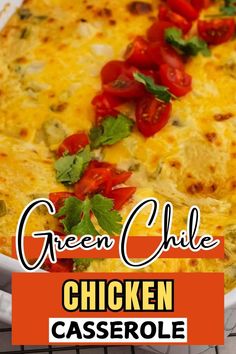 green chile chicken casserole with tomatoes and parsley on top in a white dish