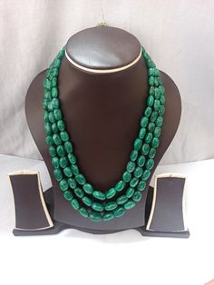 AAA 734 Carat Emerald beryl Oval Shape Fine Quality Smooth Beads With Adjustable Cord Necklace Stone : Emerald beryl Shape :- Oval Size :-6x8 - 12x17mm length - 18 inch, 3 line strings Weight :- 734 carat Polish :- Handmade color - green It is known as the 'love stone' as the message it emits is the strong vibration of unconditional love, joy, warmth and healing. As quartz crystals are profound amplifiers of energy, it may help to kindle happiness, love, romantic feelings and sensuality. It is g Elegant Oval Gemstone Beads, Elegant Gemstone Oval Beads, Green Oval Polished Beads Jewelry, Oval Emerald Bead Necklace For Jewelry Making, Emerald Necklace With Oval Gemstone Beads For Jewelry Making, Oval Green Beaded Jewelry, Green Oval Beaded Jewelry, Traditional Oval Necklaces With Polished Beads, Green Oval Gemstone Bead Necklace