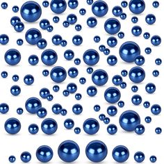 many shiny blue pearls are scattered on a white background