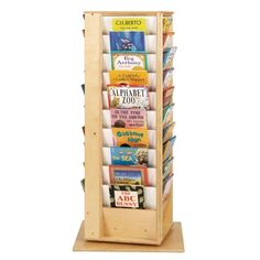 a wooden book stand with many books on it