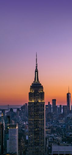 the empire building in new york city at sunset