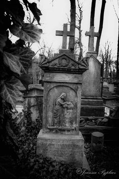 black and white photograph of an old cemetery