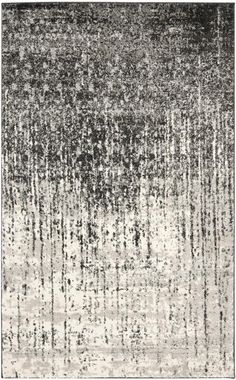 an abstract rug with black and white colors