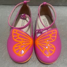 Gently Used! Worn 2-3 Times Sophia Webster Mini Fuschia Bibi Butterfly Shoes. Please Note Left Shoe Has Small Marks ( Reference Picture) Overall In Very Good Condition. Come With Original Box. Size Eu 25, Us 8,5 Retail Price $240 Cute Pink Flat Sneakers, Pink Non-slip Flat Heel Sneakers, Pink Non-slip Sneakers, Pink Sneakers With Soft Round Toe, Pink Sneakers With Soft Sole And Round Toe, Pink Closed Toe Sneakers For Spring, Sophia Webster Shoes, Butterfly Shoes, Mini Butterfly