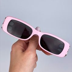 Balenciaga Bb0096s 012 Sunglasses Pink Silver Logo Grey Rectangle Unisex Brand: Balenciaga Model: Bb0096s Color Code: 012 Gender: Unisex Year: 2023 Frame Colour: Pink Silver Logo Frame Shape: Rectangle Frame Style: Full Rim Frame Material: Plastic Lens Material: Plastic Lens Color: Grey Lens Protection: Category 3 Size: 51x18x130 100% Uv Protection Made In Italy. Full Retail Package With All Accessories: Case, Cloth And All Paperwork. 100% Authentic! Modern Pink Sunglasses With Tinted Lenses, Pink Rectangular Sunglasses With Gradient Lenses, Pink Rectangular Polarized Sunglasses, Pink Rectangular Sunglasses With Uv Protection, Pink Square Frame Sunglasses For Spring, Trendy Pink Square Frame Sunglasses, Chic Pink Square Frame Sunglasses, Pink Square Frame Sunglasses With Tinted Lenses, Pink Square Frame Sunglasses For Party