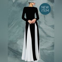 Step Into Elegance With This Striking Black And White Maxi Dress, Designed To Make A Statement At Any Event. The Sleek Black Bodice Offers A Flattering, Fitted Silhouette, While The Flowing A-Line Skirt Features Bold White Paneling, Creating A Dramatic Yet Sophisticated Look. The High Neckline And Long Sleeves Add A Touch Of Modesty, Perfect For Formal Occasions Or Evening Wear. Made From Lightweight Fabric That Ensures Graceful Movement, This Dress Blends Modern Style With Timeless Class. Black And White Maxi Dress, Black White Maxi Dress, Graceful Movement, White Maxi Dress, White Paneling, White Maxi, Design Dress, Sophisticated Design, Fitted Silhouette