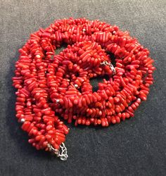 A beautiful statement coral necklace in a deep red. Very good condition. Small, even coral parts strung on 7 strands. The coral necklace is 46 cm long. Luxury Red Coral Necklace, Coral Multi-strand Beaded Necklaces, Coral Multi-strand Beaded Necklace, Coral Red Multi-strand Beaded Necklaces, Elegant Multi-strand Red Coral Beaded Necklaces, Adjustable Hand-strung Red Coral Beaded Necklaces, Multi-strand Red Coral Beaded Necklaces, Luxury Hand-strung Red Coral Beaded Necklaces, Adjustable Hand-strung Red Coral Necklace