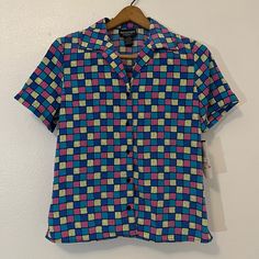 Nwt- Notations Vintage Multicolored 80s Button Up Blouse. Funky Colors Size M Cheap Retro Button-up Blouse, 80s Button Up Shirt Outfit, Retro Pink Button-up Top, Retro Pink Blouse With Buttons, Retro Pink Button-up Blouse, Blue Retro Print Button-up Top, 90s Blue Button-up Top, Blue Retro Tops With Buttons, Retro Blue Collared Blouse