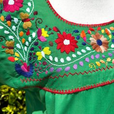 This traditional Mexican blouse is beautifully made in Puebla , Mexico, each piece is individually hand made and hand embroidered. You will love this lightweight blouse made of organic cotton, this natural material gives the blouse a delicate and relaxed feel. Details: Size M-L measurements: Bust: 40” - 27” length(shoulder to bottom Hem) loose fit Cotton thread Embroidered Material: 100% Cotton All items are shipped from the US All Mi Mundo Mexicano items are 100% handmade by artisans in Mexico. Traditional Multicolor Embroidered Cotton Top, Fiesta Multicolor Embroidered Top, Spring Fiesta Embroidered Blouse, Traditional Fiesta Tops With Floral Embroidery, Traditional Embroidered Fiesta Blouse, Embroidered Material, Leather Embroidery, Mexican Blouse, Traditional Mexican