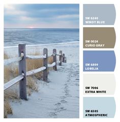 the beach is covered in sand and grass with blue, gray, and white colors