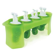 four green plastic toothbrush holders sitting on top of each other