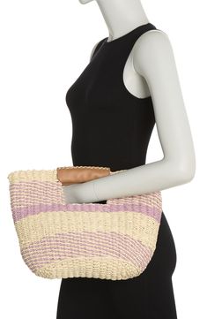 Pops of color bring a touch of whimsy and playful charm to this leather trimmed woven tote. 15" x 10.5" x 2" Top carry handles Open top Straw and leather Imported Shopping Beach Bag With Braided Top Handles, Top Handle Beach Bag With Braided Handles For Shopping, Shopping Beach Bag With Top Handle And Braided Handles, Woven Straw Top Handle Bag For Shopping, Woven Top Handle Beach Bag, Woven Top Handle Beach Bag For Shopping, Shopping Straw Satchel Bag With Rolled Handles, Straw Satchel Bag With Rolled Handles For Shopping, Brown Beach Bag With Rolled Handles For Shopping