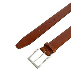 This sleek and classic calfskin belt is a must-have staple for any gentleman&#39s wardrobe. Smooth and supple calfskin is the perfect complement to a pair of formal Oxfords, or casual loafers. Meticulously handcrafted in England, this timeless Somerset belt features hand-stained edges and notches for a professional look. Available in three classic colors. Made of Calfskin Classic Leather Belt Buckles For Business Casual, Classic Business Belt In Bridle Leather, Classic Bridle Leather Business Belt, Classic Bridle Leather Belt For Business, Formal Brown Calf Leather Belt, Classic Fitted Leather Belts And Suspenders, Classic Leather Belts And Suspenders For Formal Occasions, Classic Bridle Leather Belt And Suspenders, Formal Bridle Leather Belt With Smooth Grain