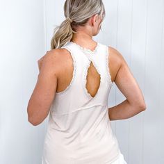 Pol Lace Embroidered Keyhole Open Back Tank Top in 4 colors Step up your summer style with our Pol Lace Embroidered Keyhole Open Back Tank Top! Be the bold risk-taker you are with this relaxed sleeveless top, complete with intricate lace trimming and a stunning open back keyhole detail that will make you stand out in the crowd! Sleeveless Lace trimming around edges Round neckline Full functioning buttons Keyhole open back with lace trimming Designed by Pol Imported Bust 17 inces Length 23 inches Comfortable Solid Color Spring Tops, Versatile Beige Cotton Tank Top, Cream Solid Color Top For Spring, Casual Beige Tank Top For Everyday, Oatmeal Tops For Spring Everyday Wear, Oatmeal Tops For Everyday Spring Wear, Casual Oatmeal Tops For Summer, Casual Oatmeal Summer Tops, Beige Cotton Tank Top With Relaxed Fit