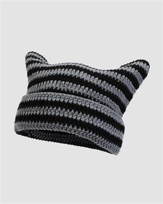 a crocheted black and grey hat with two rows of stripes on the front