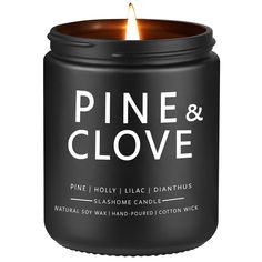 a candle that says pine and clove on it