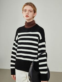 Editor's NotesThis product is a knit sweater made of acrylic and wool mixed fabric and features a loose fit and marine stripe pattern. - Knit sweater- Acrylic and wool mixed fabric- Loose fit- Marine stripe patternMeasurements(in.)Size: One Size(XS-M)- Chest: 43.7in.- Shoulder: 20.47in.- Hem: 19.68in.- Total Length: 22.83in. *Model info: Height 5' 57, Top/Bottom -S size Composition & Care- Fabric: 86% Acrylic, 14% Wool- Light Hand Washing or Dry Cleaning Designer- by We'Dee Knit Crew Neck Sweater With Contrast Stripes, Knit Sweater With Contrast Stripes Crew Neck, Knit Sweater With Contrast Stripes, Knit Crew Neck Sweater With Horizontal Stripes, Knit Sweater With Horizontal Stripes And Crew Neck, Black Horizontal Stripe Sweater For Fall, Black Horizontal Stripe Winter Sweater, Oversized Striped Chunky Knit Sweater, Oversized Winter Sweater With Contrast Stripes