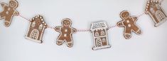 gingerbread cutouts are strung on a string