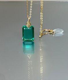 Gorgeous sparkly Colombian emerald pendant necklace. The rectangle shape facet pendant is eye-clean and has gorgeous Caribean ocean green color that brings lots of depth to the stone and reflects lights beautifully. The ultra-fine pendant has great clarity and reflects lights beautifully and is attached to a gold-filled bail and suspended on a 14k gold fill chain. The necklace is elegant and has a lux look. * AAA+ Flawless Faceted Colombian emerald (20 cts) * Pendant size(with the bail): 27x18 m Formal Necklace With Rectangular Gemstone Pendant, Formal Gemstone Necklace With Rectangular Pendant, Rectangular Gemstone Necklace For Formal Occasions, Formal Rectangular Gemstone Necklace, Elegant Rectangular Emerald Necklace For Formal Occasions, Elegant Rectangular Emerald Necklace For Formal Events, Classic Green Necklace With Rectangular Pendant, Faceted Emerald Cut Necklace For Gifts, Gold Rectangular Emerald Necklace For Formal Occasions