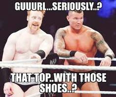 two men sitting next to each other on top of a wrestling ring with the caption that says, guur seriously? that top with those shoes?