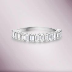 This beautiful halfway band is a wonderful gift idea for occasions like wedding or anniversary featuring gleaming Emerald cut diamonds. This comes in white gold, yellow gold or rose gold. You can't go wrong with this simple and classic choice as a wedding band or anniversary ring, especially for the woman who has more Emerald Cut Cubic Zirconia Half Eternity Diamond Ring, Timeless Diamond White Emerald Cut Eternity Band, Timeless Emerald Cut Diamond Eternity Band, Luxury Emerald Cut Half Eternity Diamond Ring, Moissanite Emerald Cut Half Eternity Diamond Ring, Emerald Cut Moissanite Diamond Ring With Half Eternity, Fine Jewelry Emerald Cut Baguette Diamond Eternity Band, Emerald Cut Diamond Eternity Band With Baguette Diamonds, Emerald Cut Baguette Diamond Eternity Band