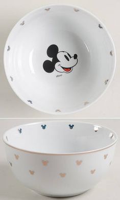 two bowls with mickey mouse faces on them