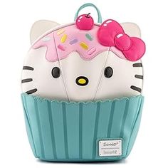 a hello kitty cupcake purse with a pink bow on top