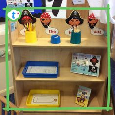 children's bookshelf with pirate themed items on it