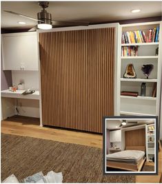 a bed room with a book shelf and a window covered in blinds on the wall