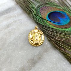 18K Gold Pendant of Indian God Shiva * Gold Pendant Necklace Finding * 18k Gold Charm * Charm Pendant Bead DIY Jewellery Findings * KC1511 Thank you for visiting our shop! Please Check Out Our Solid 18k solid Gold pendant handmade charm of Indian God Shiva / Shiv / Shivling selection for the best handmade, unique items for your jewelry. Country of Manufacture:India Theme:Religious Metal:Gold Size: 26X18 MM Metal Purity:18K Color: Yellow Item Number: KC1511 This gorgeous product belongs to our 18 Round 22k Gold Temple Necklace As Gift, Yellow Gold Round Pendant For Puja, 22k Gold Temple Necklace As A Gift, 22k Yellow Gold Medallion Jewelry, Yellow Gold Round Pendant Temple Necklace, Gold Temple Necklace With Round Pendant For Wedding, 22k Yellow Gold Hallmarked Temple Necklace, Luxury Gold Temple Necklace, Gold Temple Necklace With Hallmark