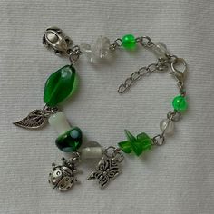 please send a message before you purchase the item. do not allow it to touch water or any chemicals. it's handmade with love. orders are shipped in 2-5 business days. Adjustable Nature-inspired Bracelets, Green Nature-inspired Beaded Bracelets As Gift, Goblincore Bracelet, Adjustable Whimsical Green Bracelets, Fairy Core Bracelets, Nature Bracelets, Handmade With Love, Earring Necklace, Chemicals