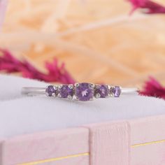 Dainty silver amethyst promise ring for her, Unique small & dainty womens promise ring, Womens amethyst silver ring, Simple silver ring WE OFFER UNLIMITED PERIOD INSTALLMENTS PLAN This is a beautiful, stunning, feminine ring that works well for all occasions, styles, and ages. You will love it! Ring information: Stones: Amethyst Approximate size: 3.0mm (1 stone) Approximate size: 2.0mm (2 stones) Approximate size: 1.75mm (2 stones) Metal type: Silver Metal stamp: 925 sterling silver Installm Dainty Amethyst Birthstone Ring Gift, Dainty Amethyst Promise Ring With Birthstone, Dainty Amethyst Ring In Lavender, Dainty Amethyst Ring With Accent Stones, Dainty Amethyst Birthstone Ring, Lavender Crystal Promise Ring, Purple Dainty Birthstone Promise Ring, Lavender Birthstone Promise Ring, Dainty Lavender Amethyst Ring