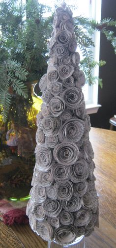 a small tree made out of rolled up paper