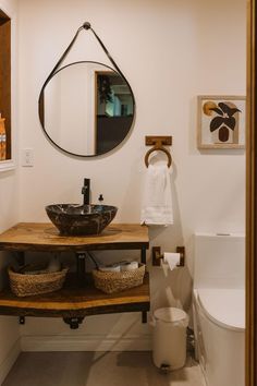 a bathroom with a sink, mirror and bathtub