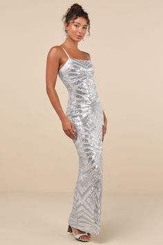 Shine like the queen that you are in the Lulus Glimmering Beauty Silver Sequin Sleeveless Column Maxi Dress! Dazzling silver sequins create an intricate pattern across stretchy mesh knit as it shapes this eye-catching dress that falls from satin adjustable spaghetti straps into a straight neckline and a fitted bodice. The figure-skimming silhouette continues into a column skirt that ends at a maxi hem with a flirty thigh-high side slit. Hidden back zipper/clasp. Fit: This garment fits true to si Silver Long Dress, Best Formal Dresses, Silver Prom Dress, Mac Duggal Dress, Sequin Homecoming Dress, Winter Wedding Guest Dress, Spring Wedding Guest Dress, Best Wedding Guest Dresses, Column Skirt