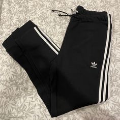 Sweatpants To Wear During Fall. Brand New, Tag Still On. No Returns. Stretch Black Sweatpants With Three Stripes, Black Stretch Sweatpants With Three Stripes, Adidas Stretch Sweatpants For Streetwear, Adidas Black Bottoms With Side Stripes, Adidas Black Joggers With Side Stripes, Adidas Black Joggers With Three Stripes, Black Adidas Sweatpants For Loungewear, Adidas Black Sweatpants With Three Stripes, Adidas Black Three Stripes Joggers