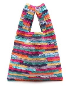 a multicolored crocheted bag on a white background