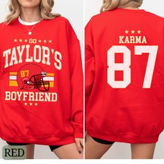 Go Taylor's Boyfriend Sweatshirt, Karma 87 Sweatshirt, KC Fan Sweater, Red Black or Gray Sweater, Taylor Fan Shirt, Football Party Sweater. Perfect for any Taylor Fan who is going to watch the big game on February 11th! Show your love of the hottest new couple that is the talk of the country! Ideal for any situation, a unisex heavy blend crewneck sweatshirt is pure comfort. These garments are made from polyester and cotton. This combination helps designs come out looking fresh and beautiful. The collar is ribbed knit, so it retains its shape even after washing. There are no itchy side seams on these sweaters.  .: 50% cotton, 50% polyester .: Medium-heavy fabric (8.0 oz/yd² (271.25 g/m .: Loose fit .: Sewn-in label .: Runs true to size Red Winter Fan Gear Tops, Red Crew Neck Sweatshirt For Fans, Red Sweatshirt For Fall Fan Merchandise, Red Crew Neck Sweatshirt For Fan Merchandise, Red Sweatshirt For Fan Merchandise, Fall Season, Red Sweatshirt For Fan Merchandise In Fall, Red Sweatshirt For Sports Season Fan Merchandise, Red Sweatshirt For Sports Fan Merchandise, Red Fan Apparel Sweatshirt For Sports Season