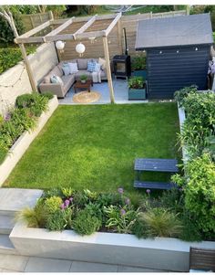 an aerial view of a small backyard garden