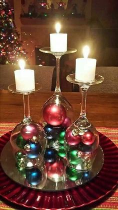 wine glasses upside down with ornaments as candles