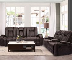 a living room with two recliners and a coffee table